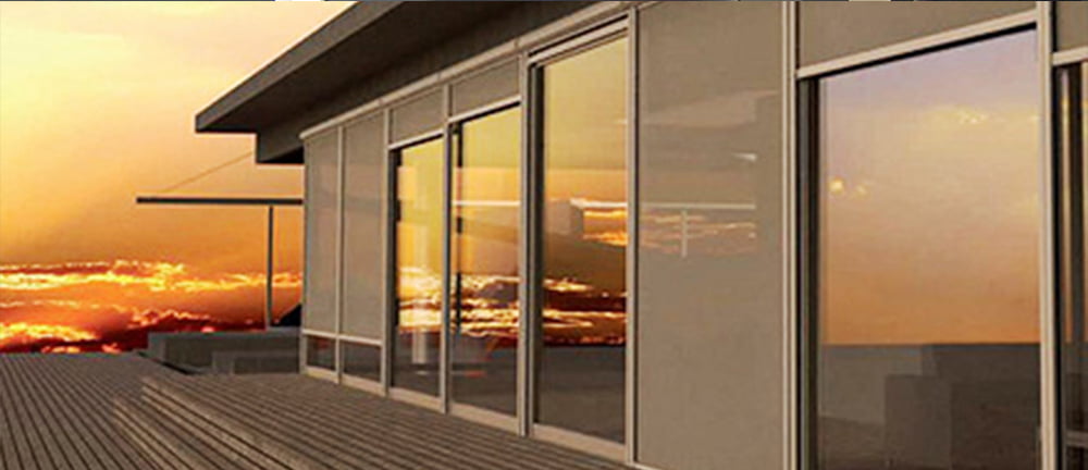 Outdoor shades picture covering sliding doors in sunset