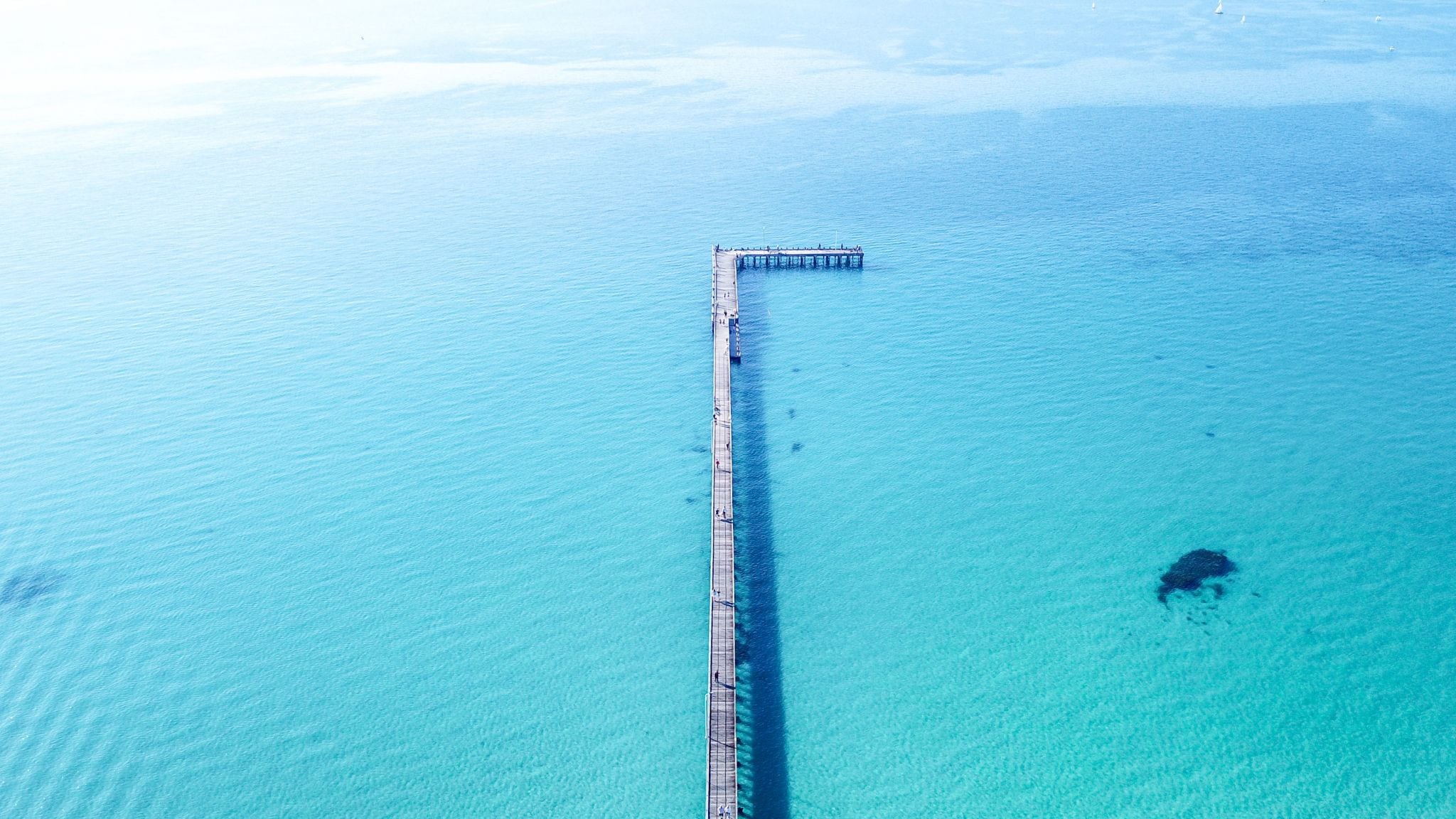 Portsea Pier is nestled in a sandy cove named Weeroona Bay, a great place for snorkelling and fishing.
